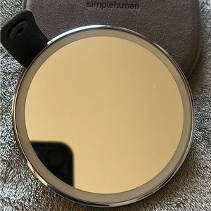 SIMPLE HUMAN TRAVEL COMPACT LIGHTED MIRROR, MAGNIFYING 10x.